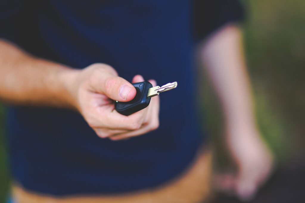 key, car key, hand, man, boy, guy, holding, people, driving, key, car key, car key, car key, car key, car key, driving, driving, driving